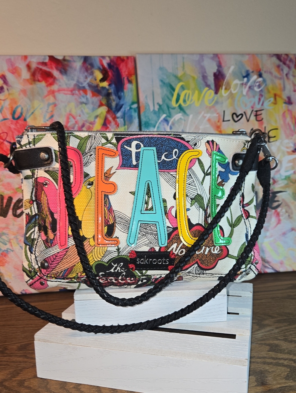Sakroots Multicolor 'Peace' Graphic Crossbody Bag with Black Braided Strap